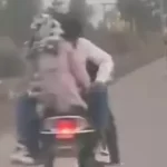 दोस्त से स्कूटी चलवाया और रास्ते भर कपल ने किया रोमांस, अश्लीलता फैलाते वीडियो वायरल